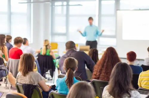 Business,And,Entrepreneurship,Symposium.,Speaker,Giving,A,Talk,At,Business